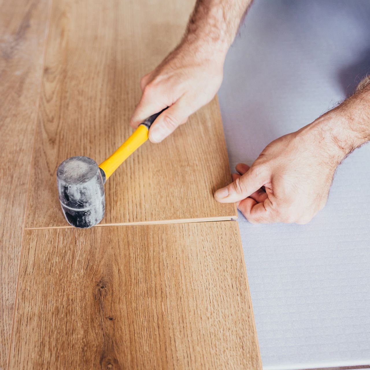 Installing flooring from Carpet Plus in Worthington