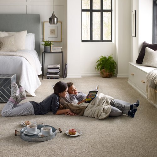 Kids reading on brown bedroom carpet from Carpet Plus in the Worthington, MN area