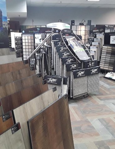 Carpet plus showroom with flooring products on display - Carpet Plus in the Worthington, MN area