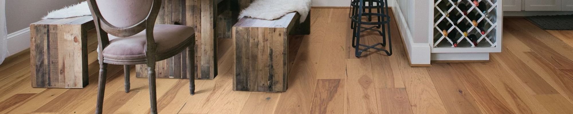 Chair and table in a room with hardwood flooring from Carpet Plus in the Worthington, MN area