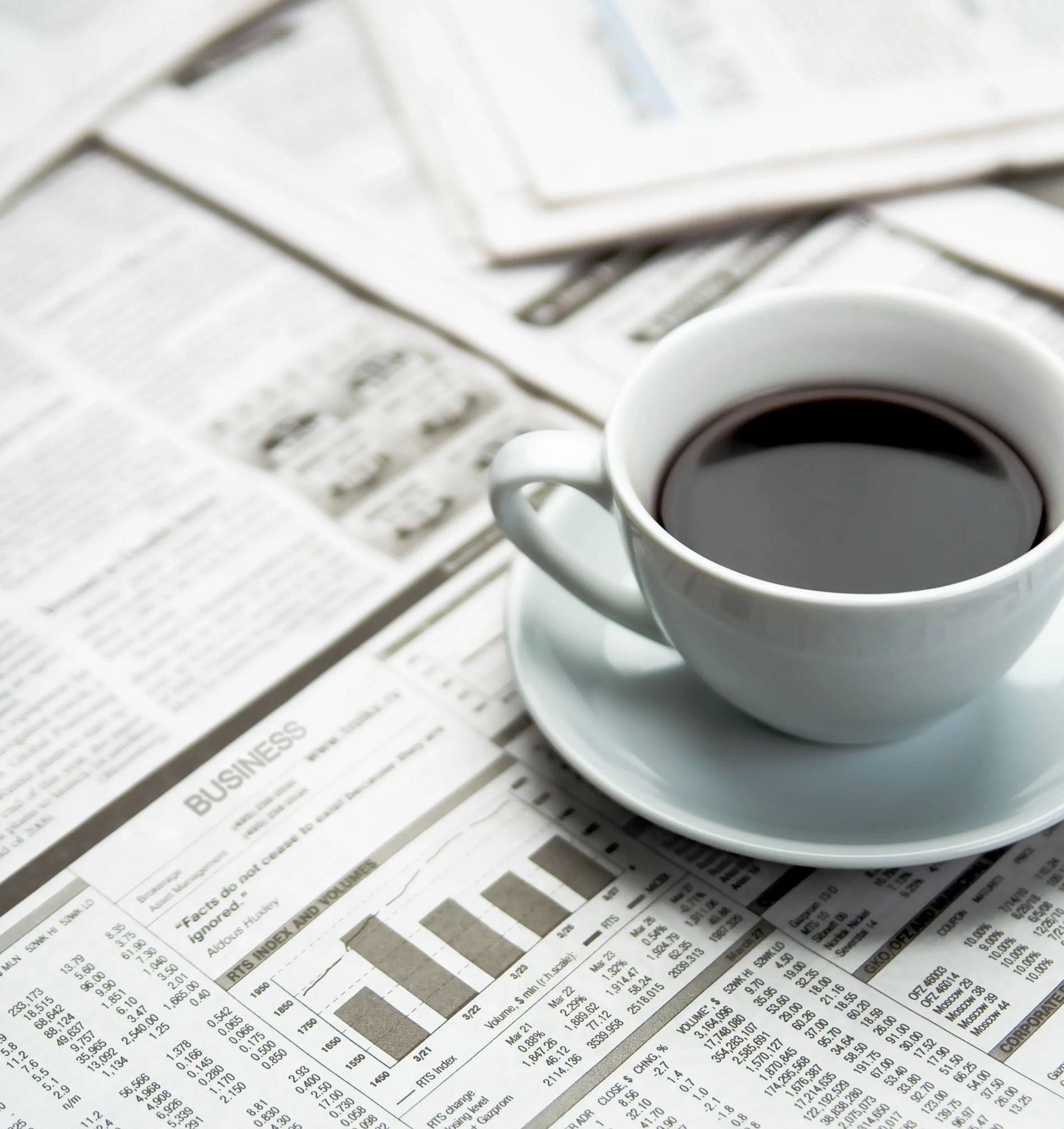 Coffee on a newspaper from Carpet Plus in the Worthington, MN area