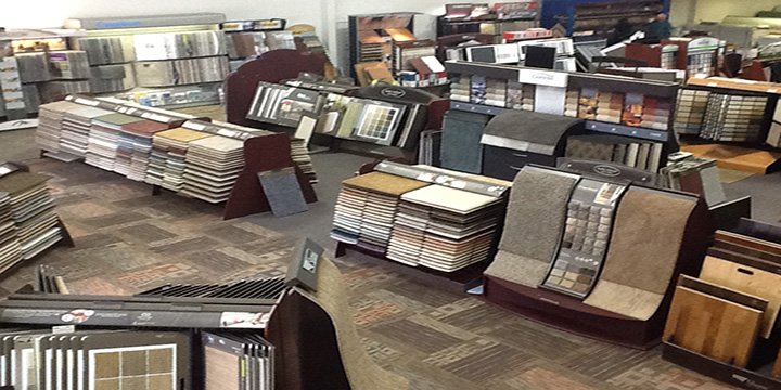 Carpet plus showroom with flooring products on display - Carpet Plus in the Worthington, MN area